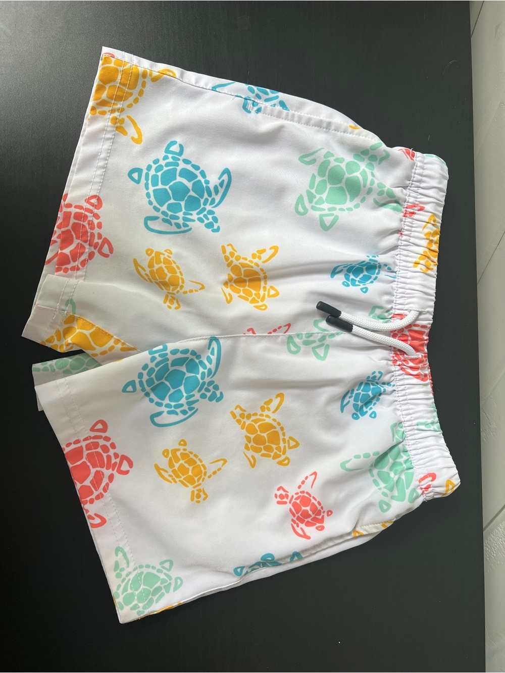 White Kids Swim Shorts with Colorful Turtle Print